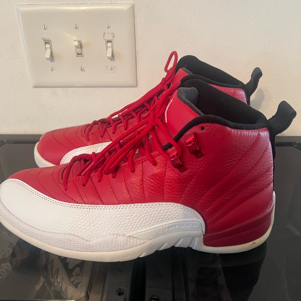 Red and White Jordan 12 Sneakers